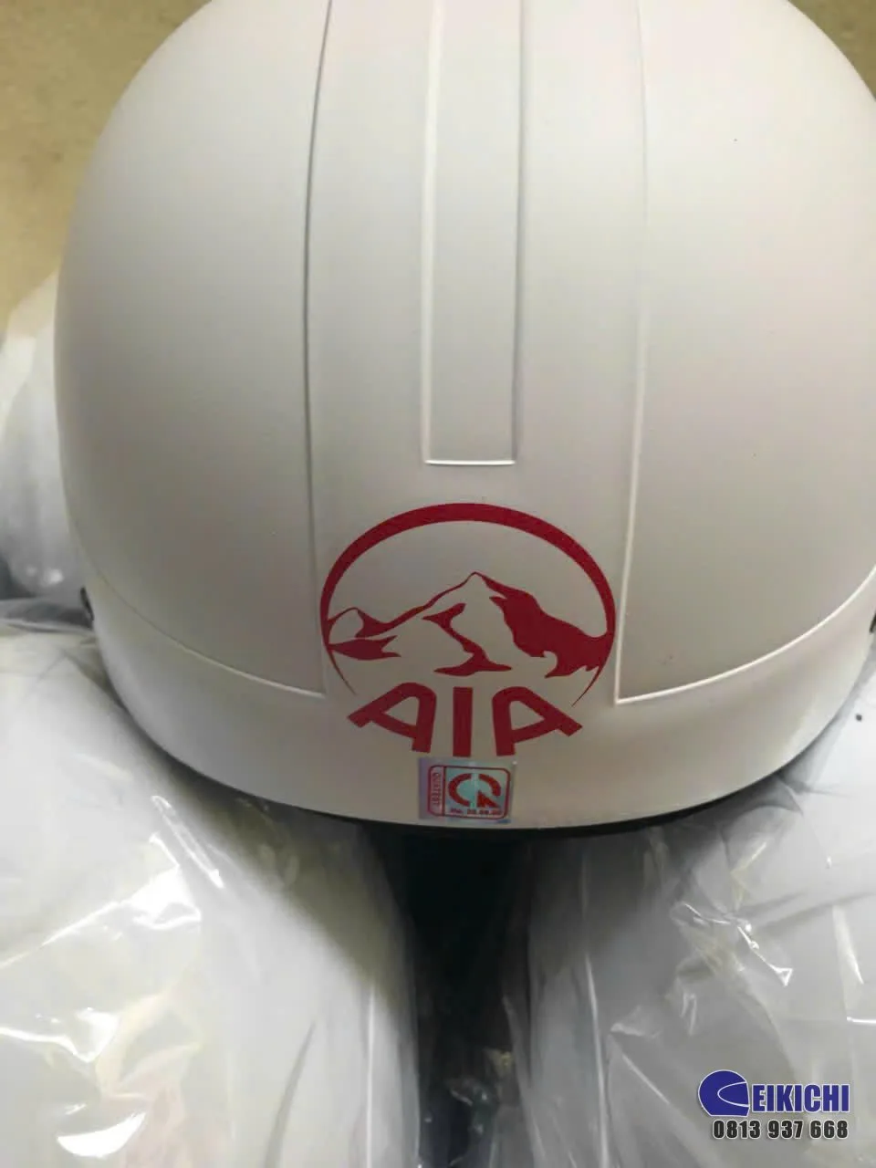 Nón Bảo Hiểm In Logo AIA Theo Yêu Cầu | Xưởng Sản Xuất Nón Bảo Hiểm EIKICHI Giá Rẻ TP.HCM